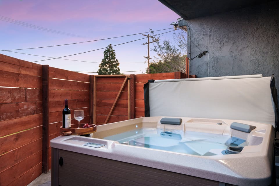 Private outdoor hot tub for a relaxing retreat.
