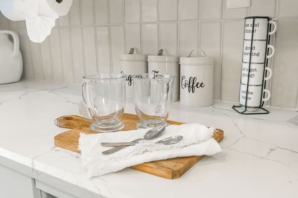 Kitchen detail showing a coffee station.