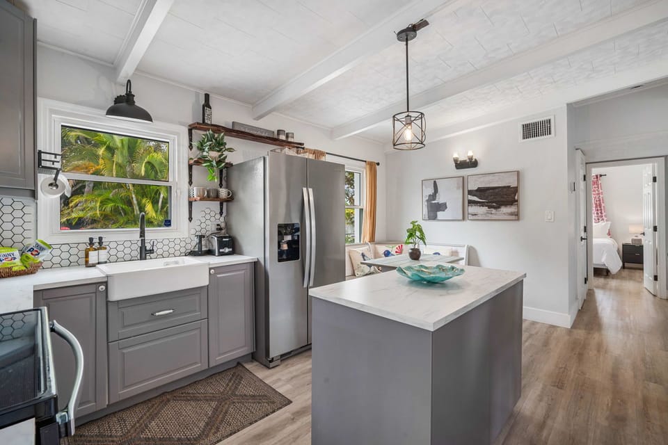 ✨ A sun-filled kitchen with a roomy island and modern finishes—cook, connect, and feel right at home 🍽️☀️
