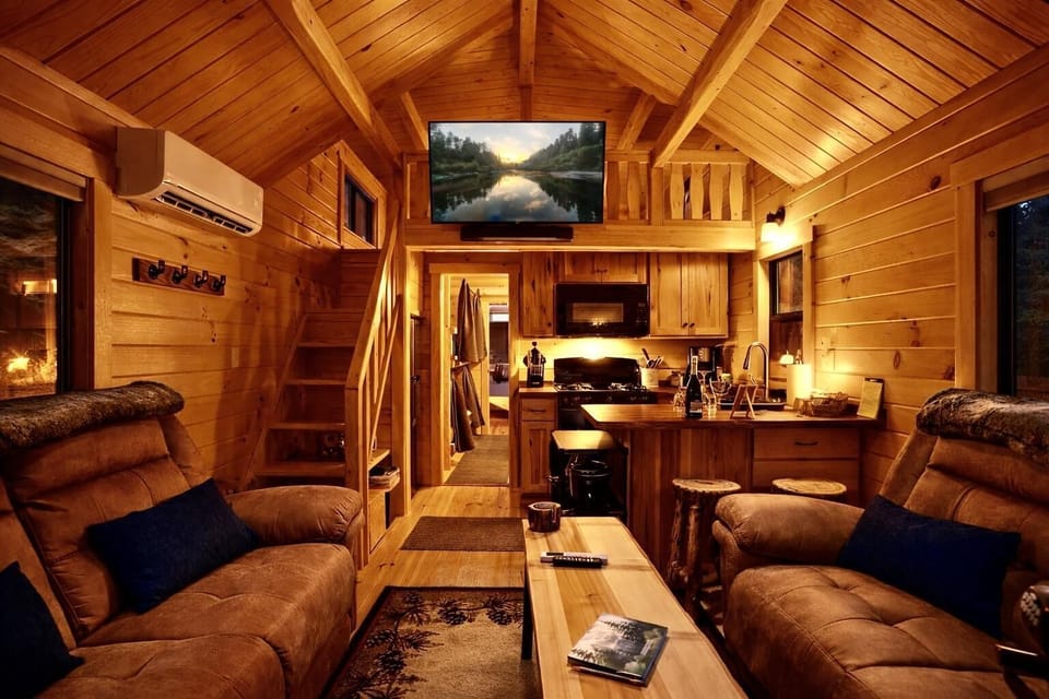 Cozy living room retreat with rustic cabin charm and warmth