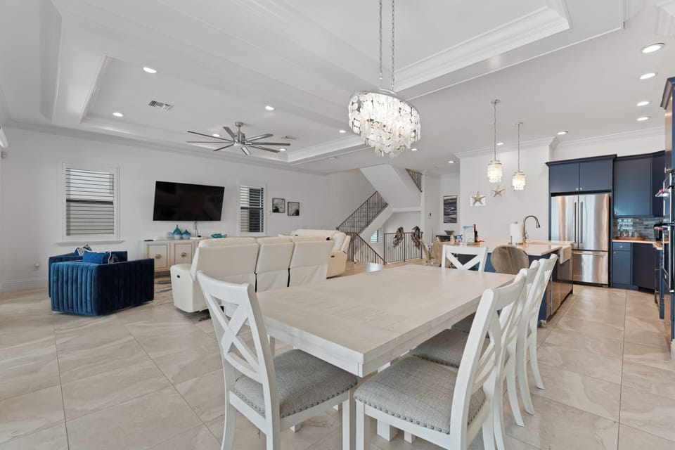 Open floor plan with kitchen, dining, and living room.