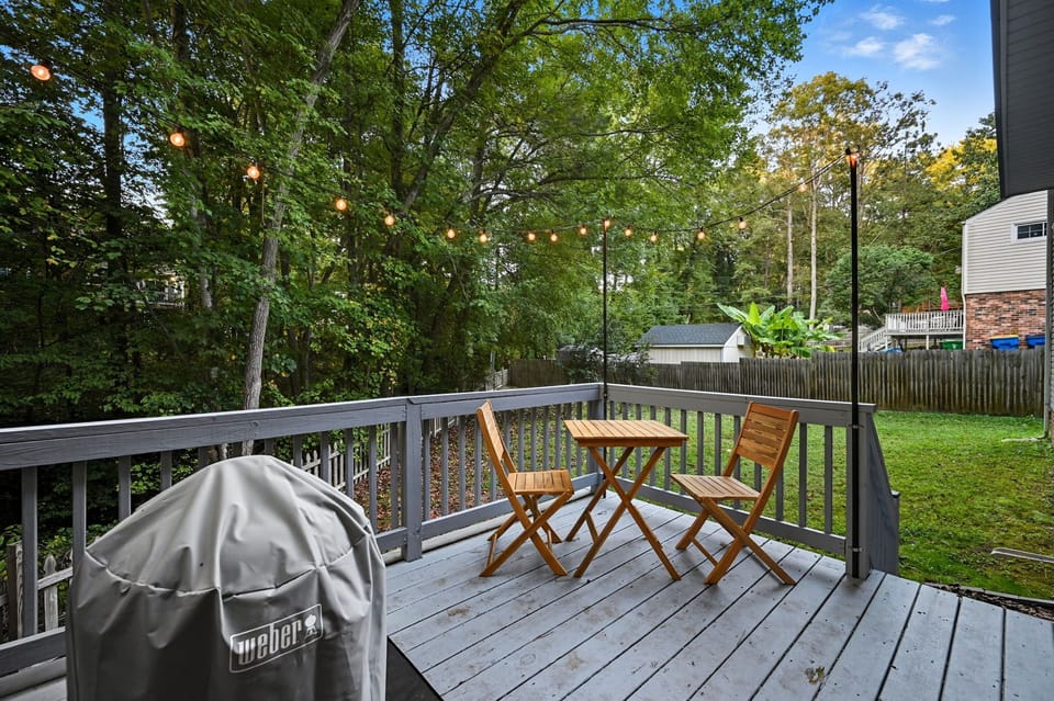 Private deck with seating, grill, and lighting — perfect for relaxed evenings.
