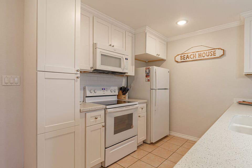 Bright, fully equipped kitchen with modern appliances