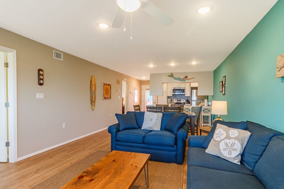 Spacious living area flowing into kitchen and dining