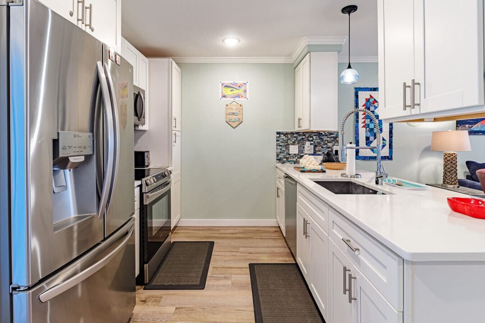 Bright galley kitchen with ample counter space