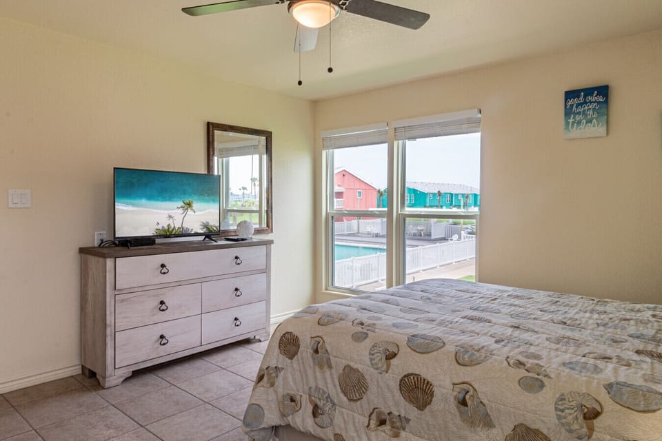 Primary bedroom with TV