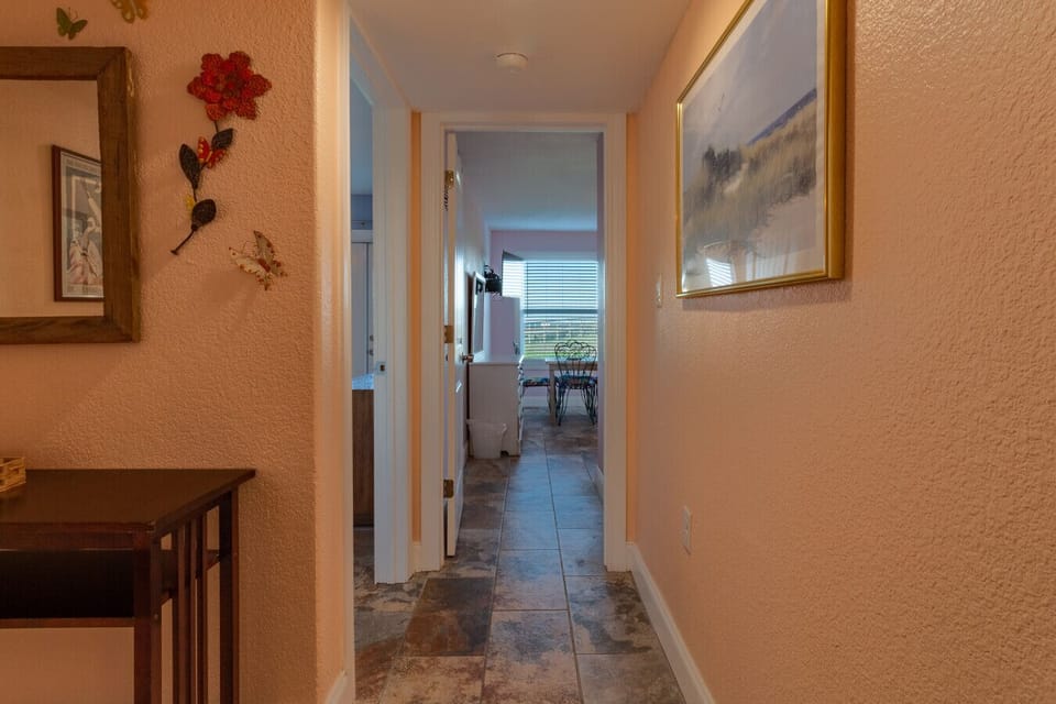 Hallway leading to bedrooms and living space