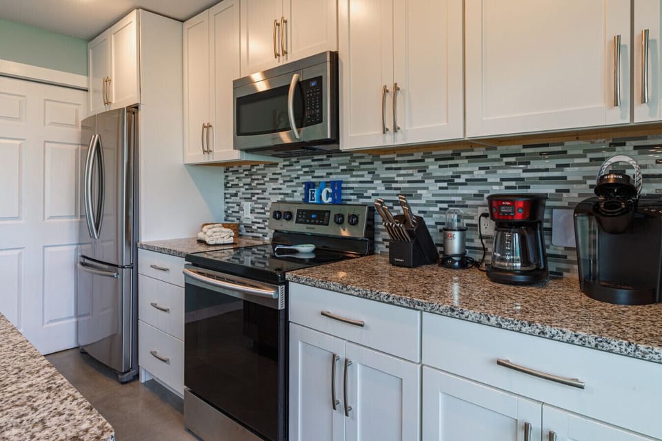 Fully equipped kitchen with stainless appliances
