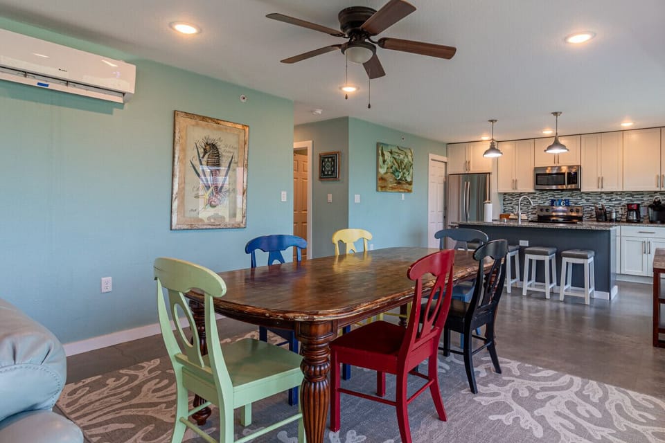 Open living and dining area with coastal style