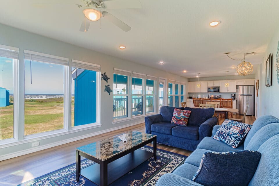 Bright living room with wall-to-wall windows