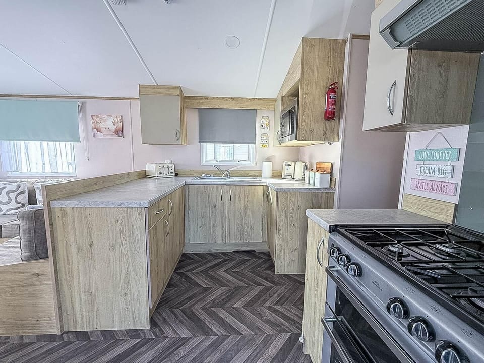 Bright modern inteiror in this caravan on Broadland Sands, discover beautiful sea views and walk along to Hopton to visit the closest beach.