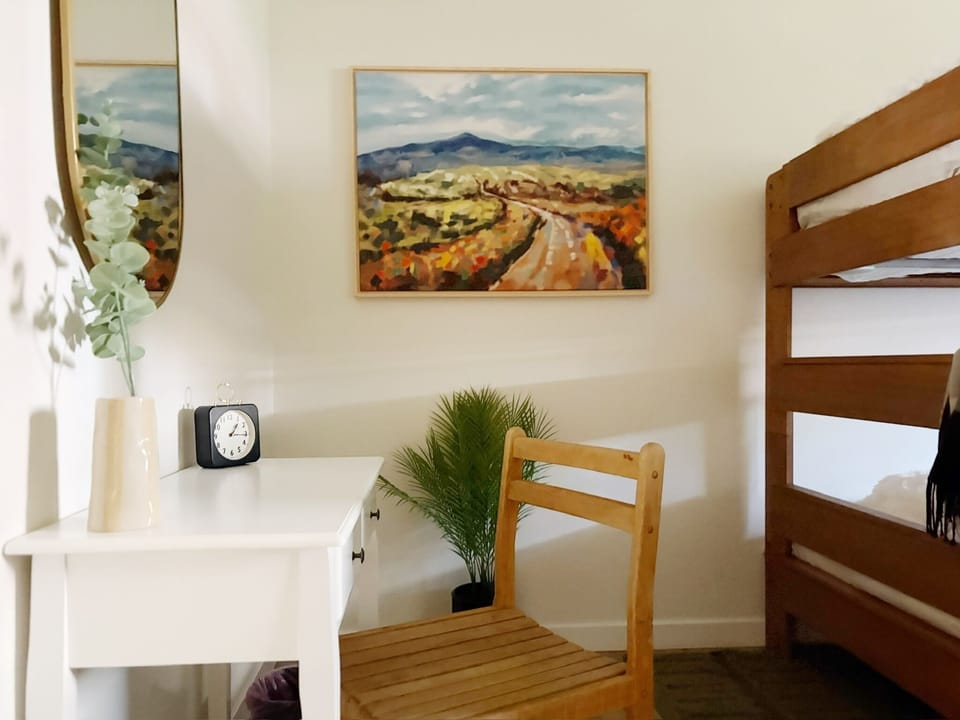 Desk in queen bunk bedroom
