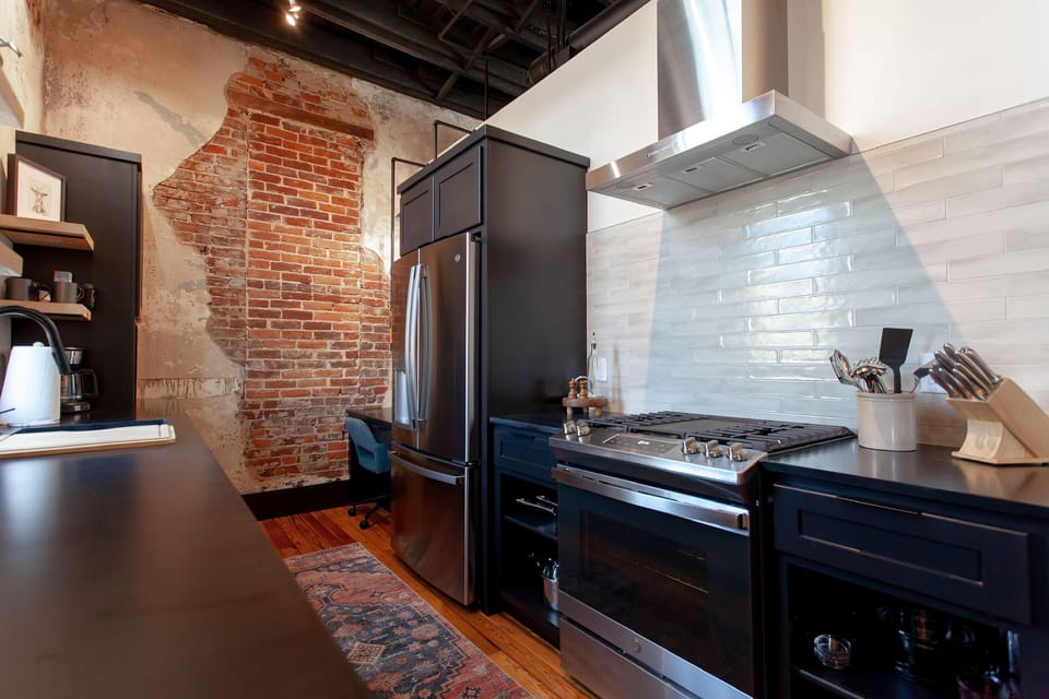 The kitchen offers full sized refrigerator, gas stove, microwave & coffee maker