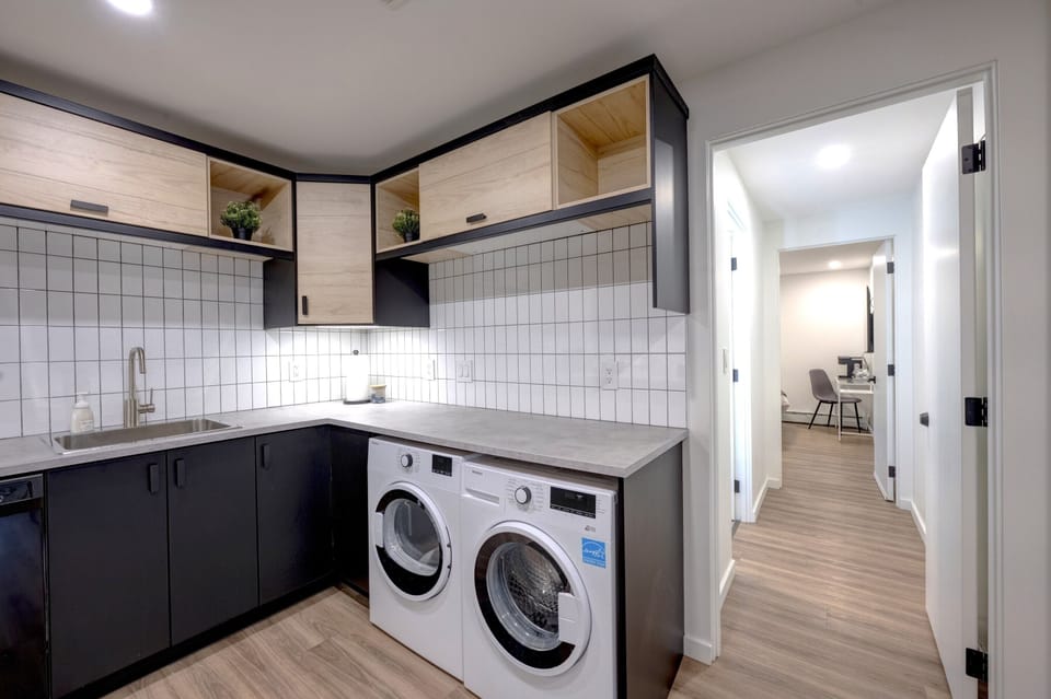 Laundry area conveniently located within the suite.