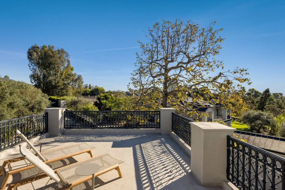 Breathtaking view from the balcony, overlooking the lush surroundings.