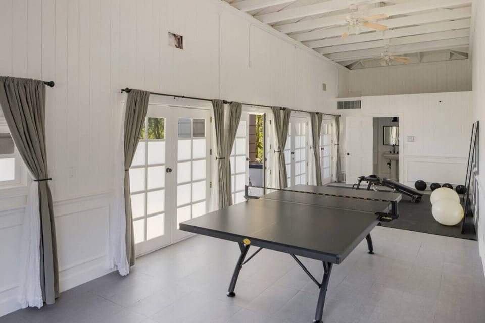 Enjoy a friendly game of ping pong in the spacious game room.