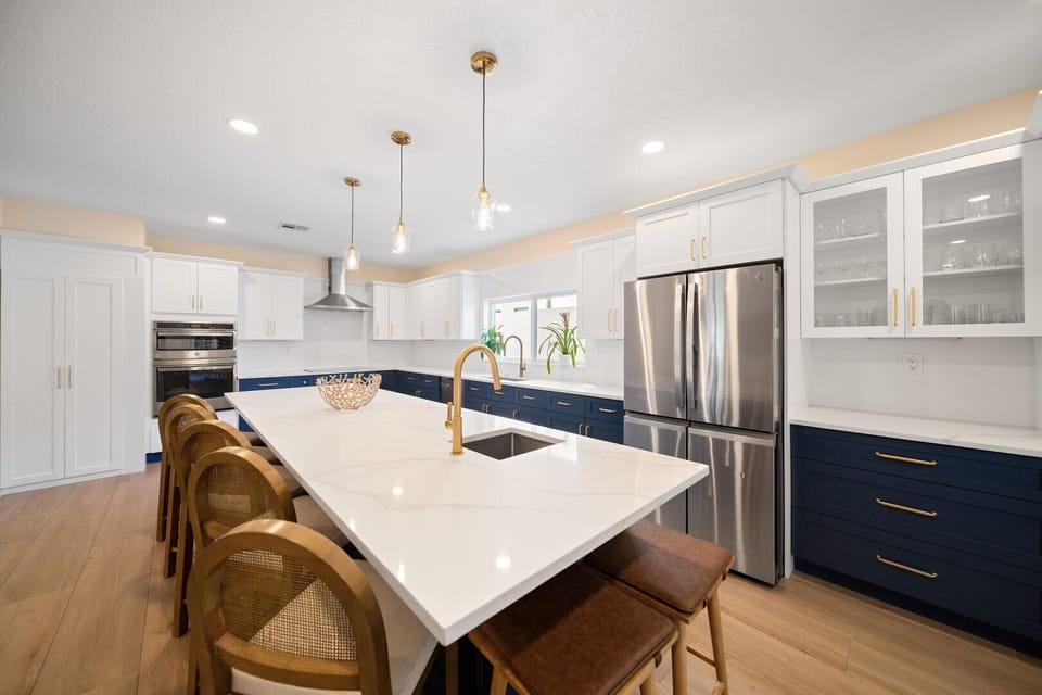 Kitchen is fully equipped with cooking utensils and dinnerware