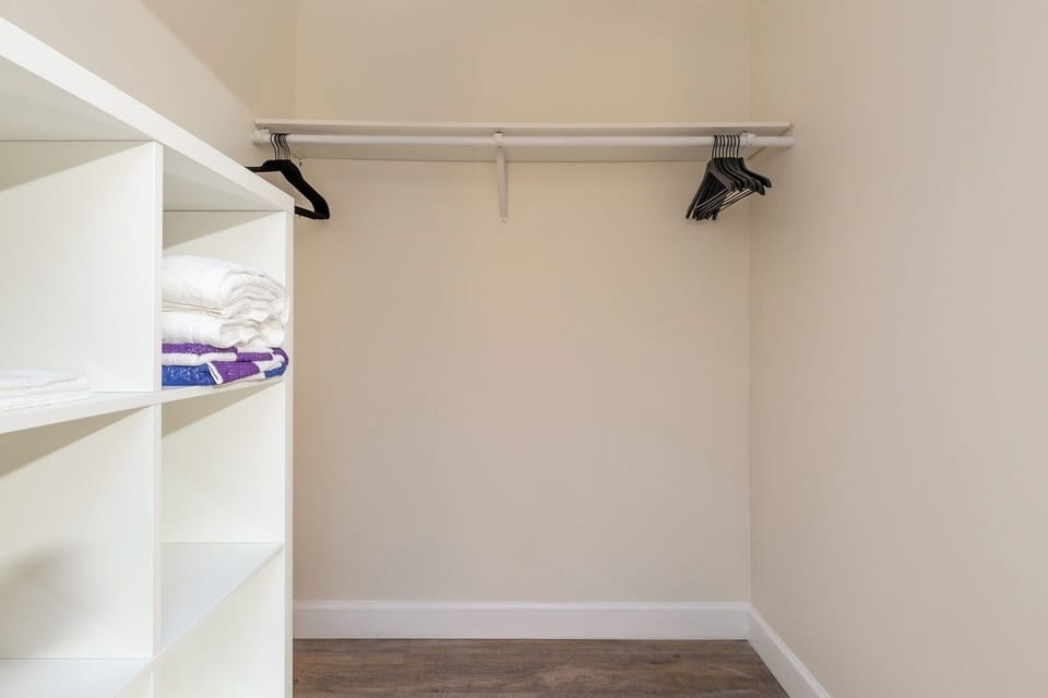 Room 1: Master bedroom walk in closet 