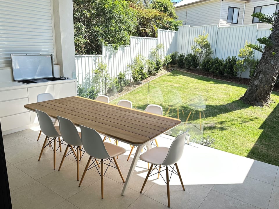 Outdoor table and kitchen with BBQ