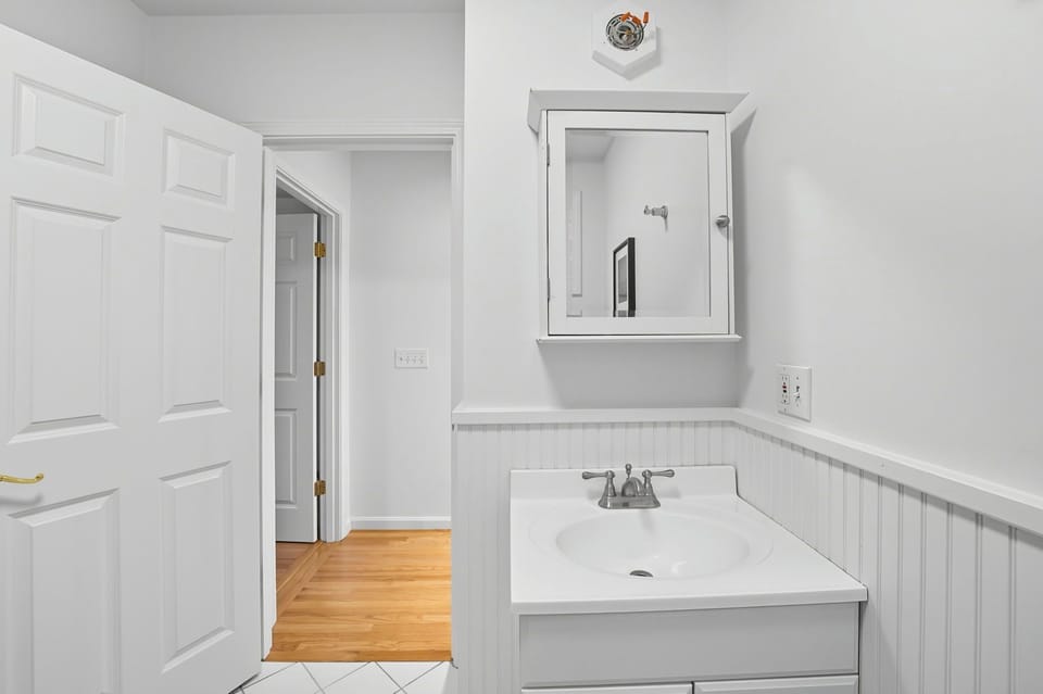 First floor bathroom with stand-up shower. 