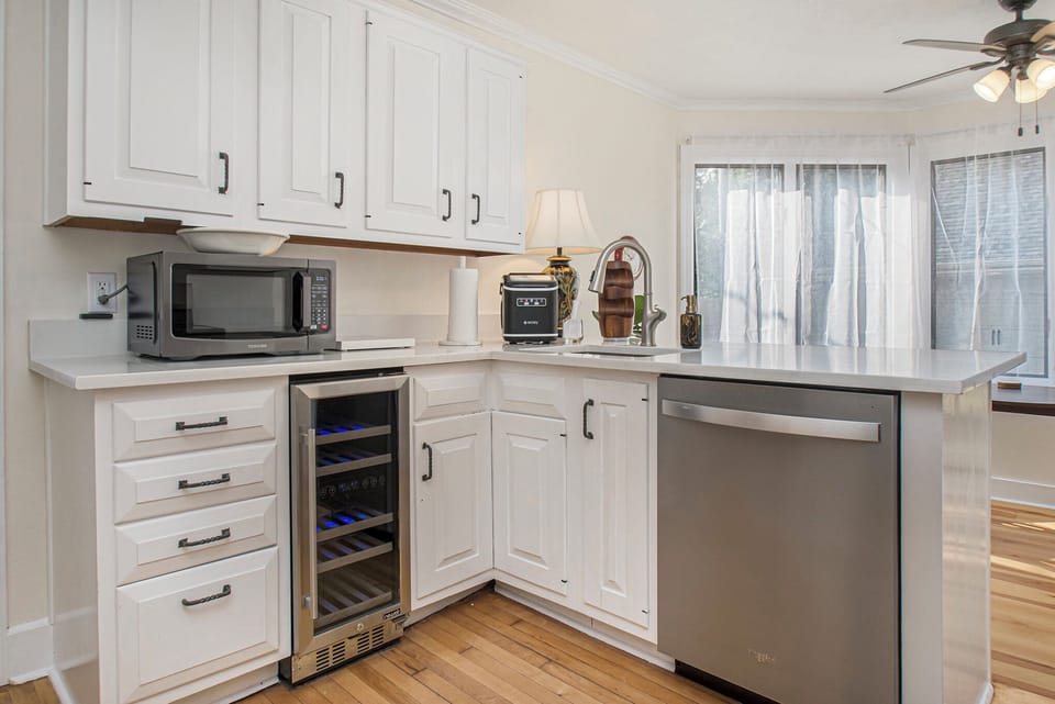 Dishwasher & dual temperature wine & beverage fridge plus microwave. 