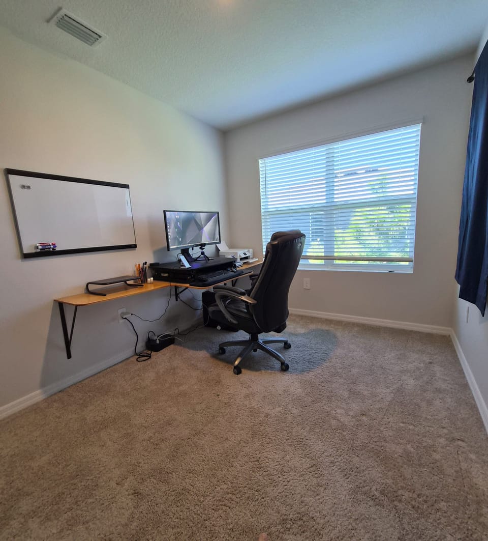 Workspace, attach your laptop to the large monitor. Sleeping area if needed.