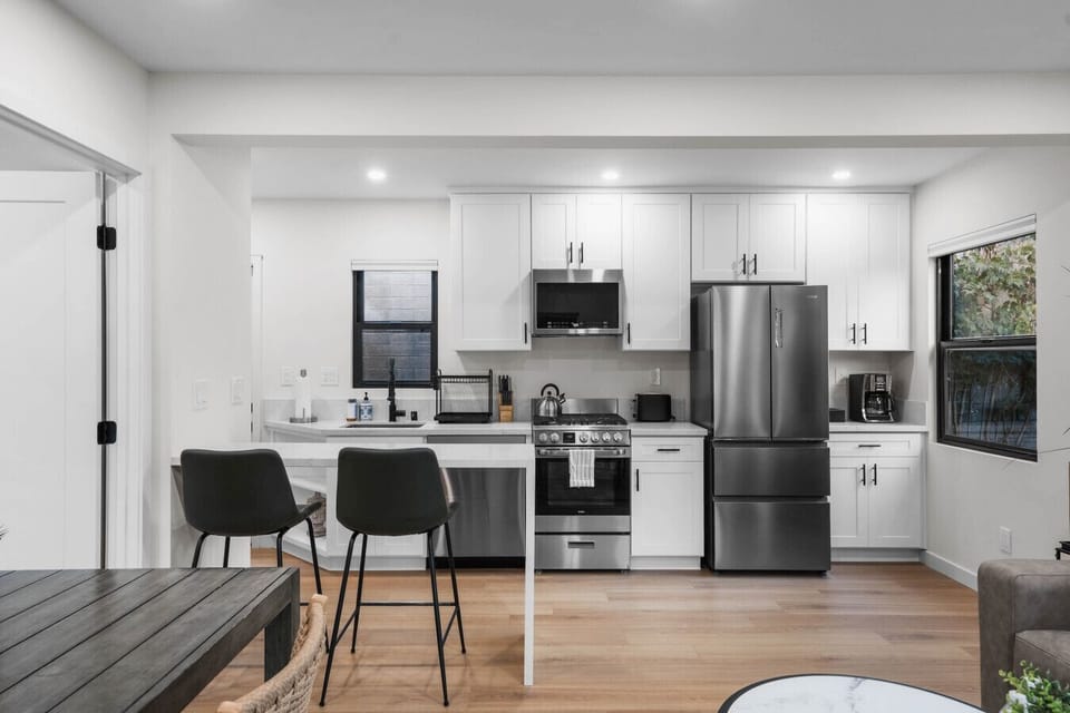 Gorgeously remodeled kitchen and dining area with space to cook and enjoy meals