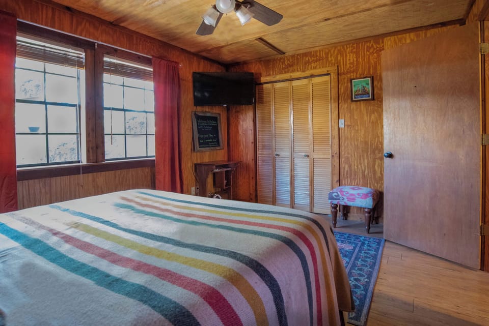 Bedroom with queen bed and Smart TV