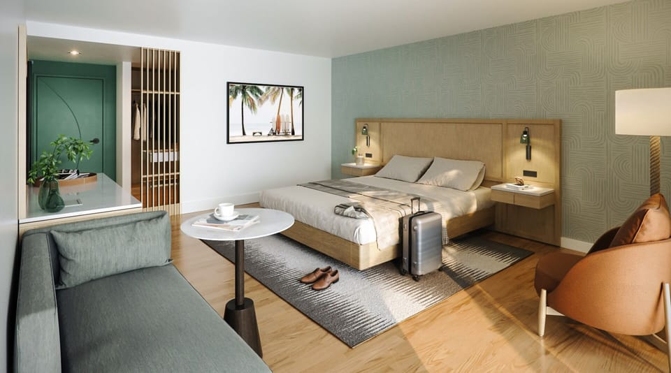 Unwind in a sunlit modern room with plush, inviting bed.