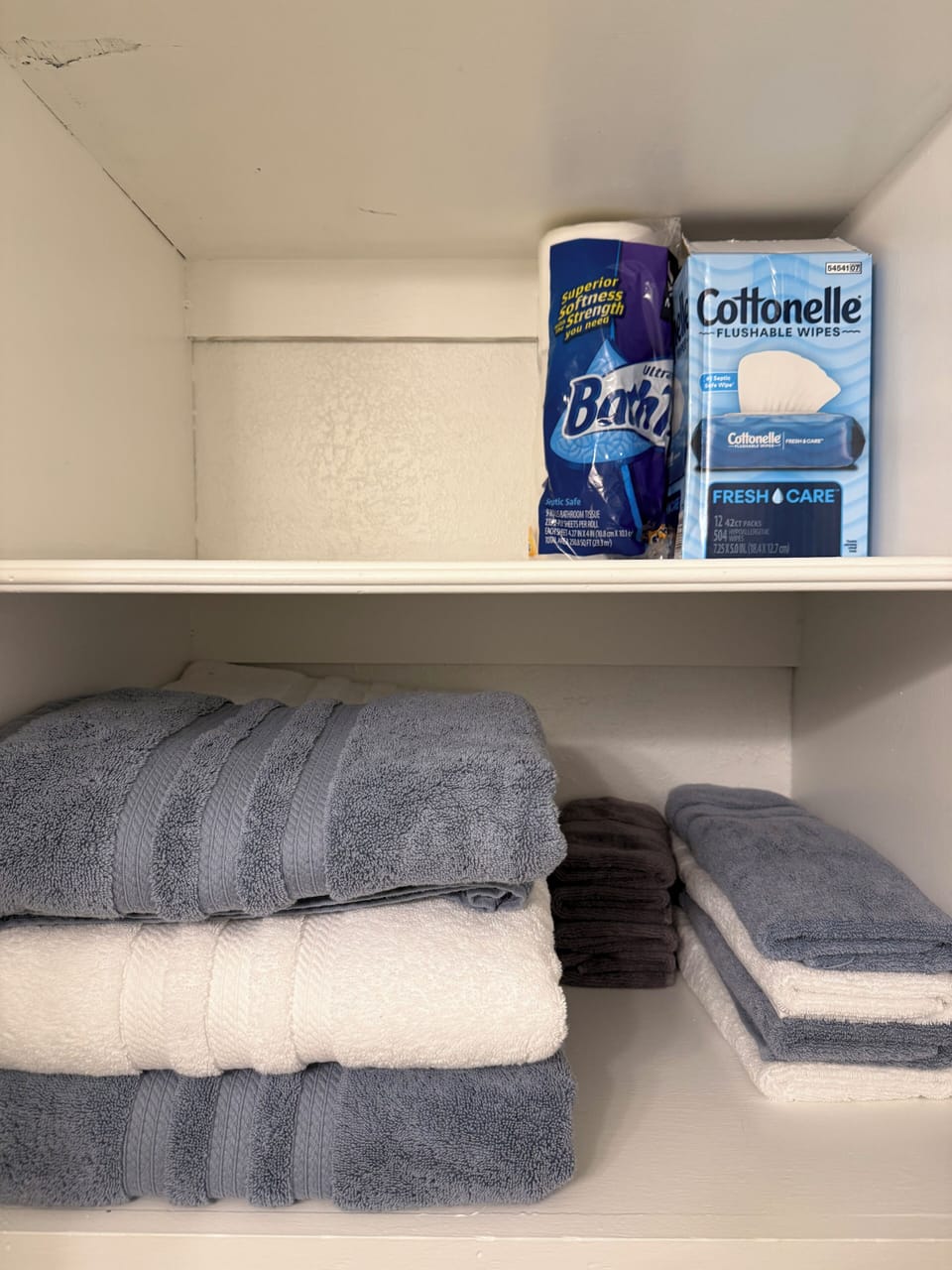 Bathroom Towels for 6 people located in bathroom closet. 