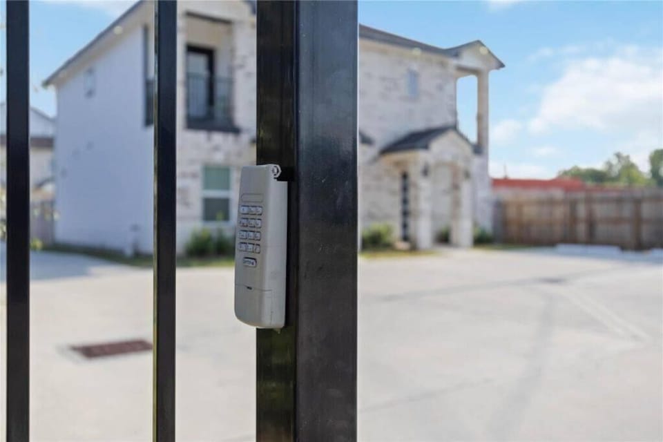 Secure gated entry with keypad access, offering privacy and control.