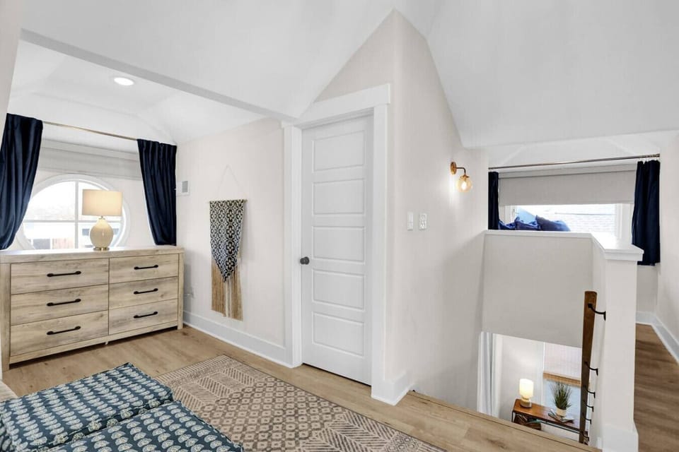 A few steps upstairs lead you to the master bedroom