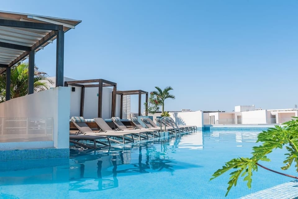 The rooftop pool (adults only) boasts one of the best views and plenty of sunshine