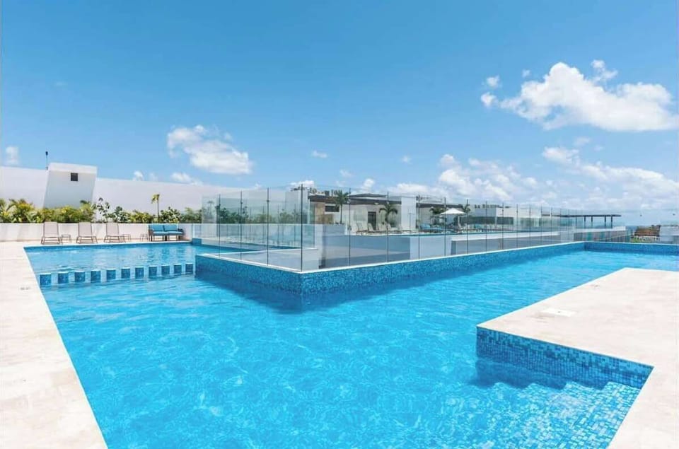 Enjoy the rooftop pool and stunning views.