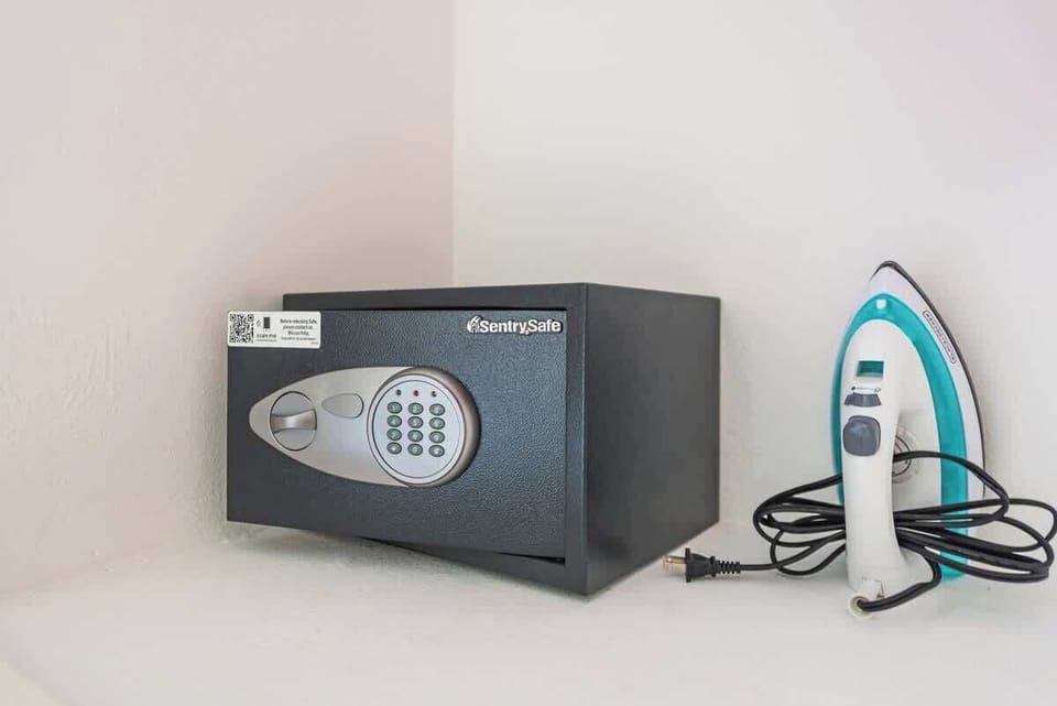 A safe to store your important things and an iron so you can take care of your appearance when you go for a walk on 5th Avenue