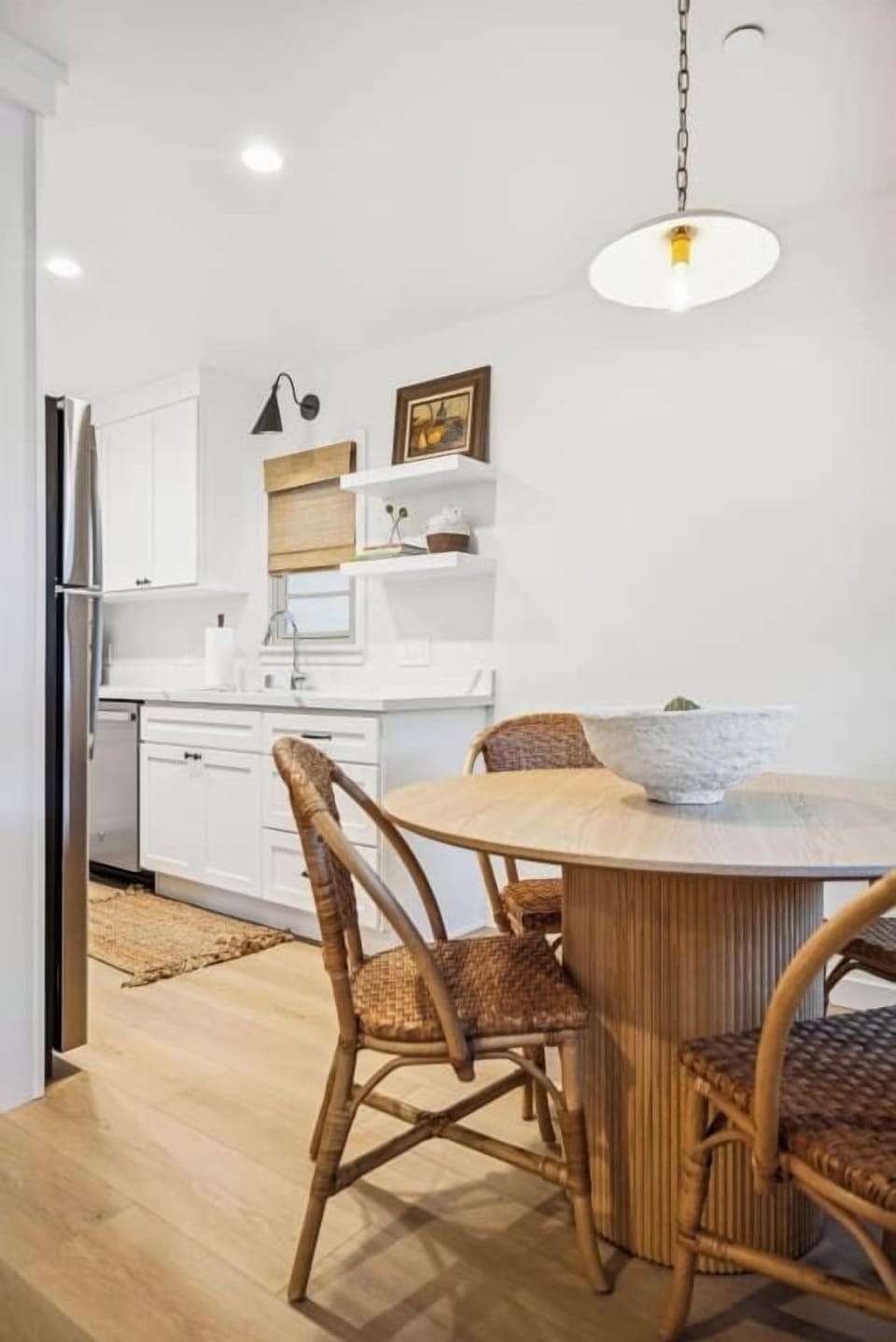 Bright dining area with seating for 4