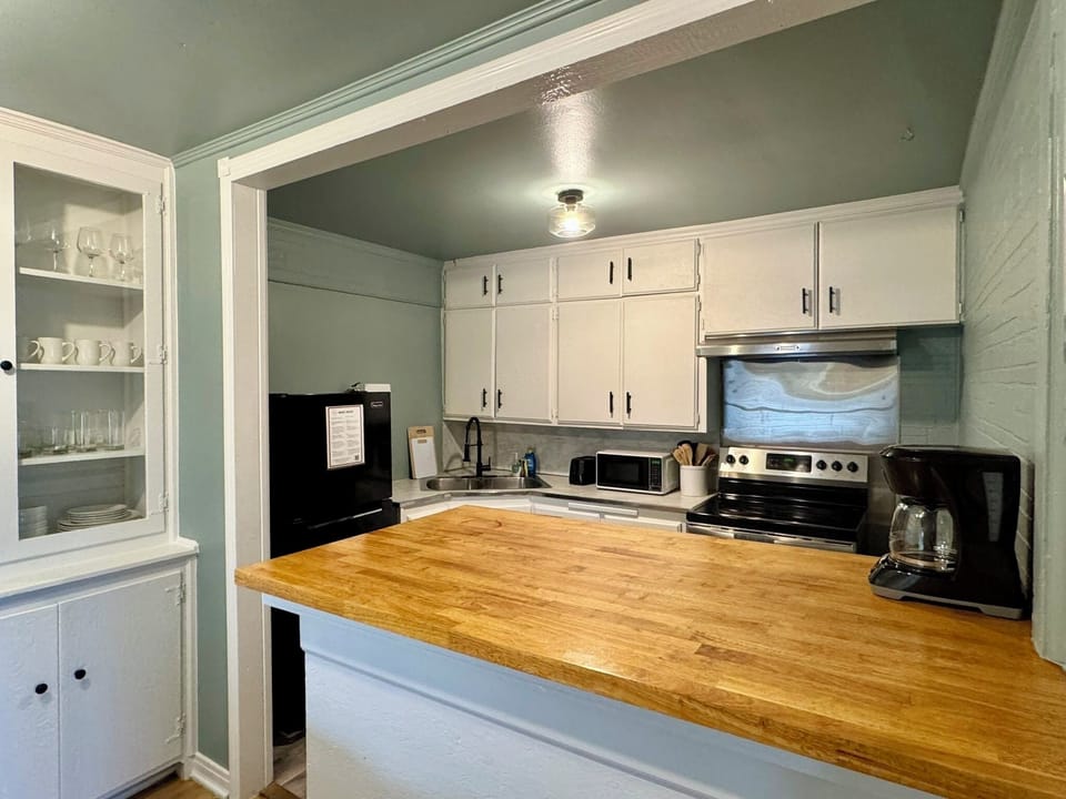 Whip up delicious meals in our cozy kitchen, fully e