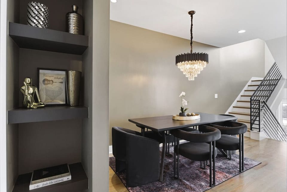 Open floor plan from the dining room to kitchen. Enjoy the dining table with comfortable seating for 6.