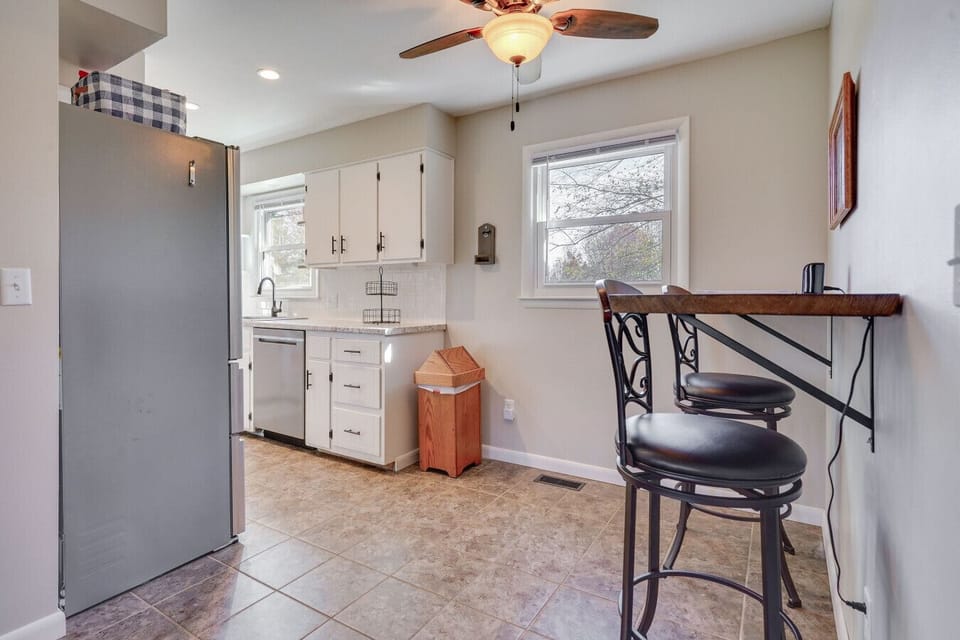 Dining Area | Wall-Mounted Table | Window Light & Ceiling Fan