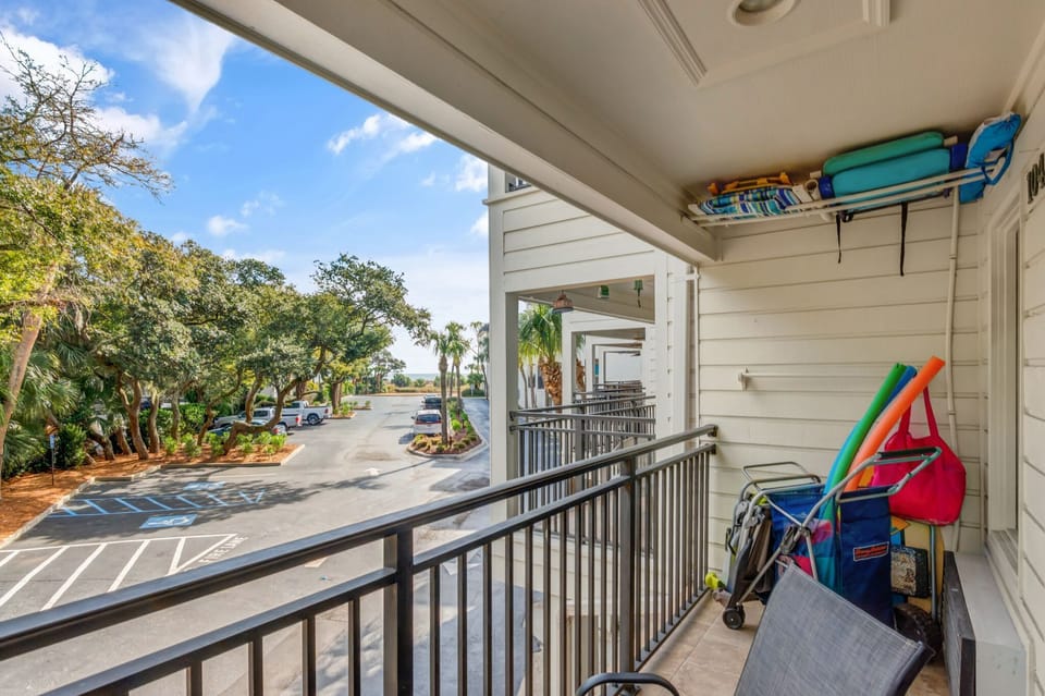 Beach chairs, a beach cart, and an umbrella are provided for your use.