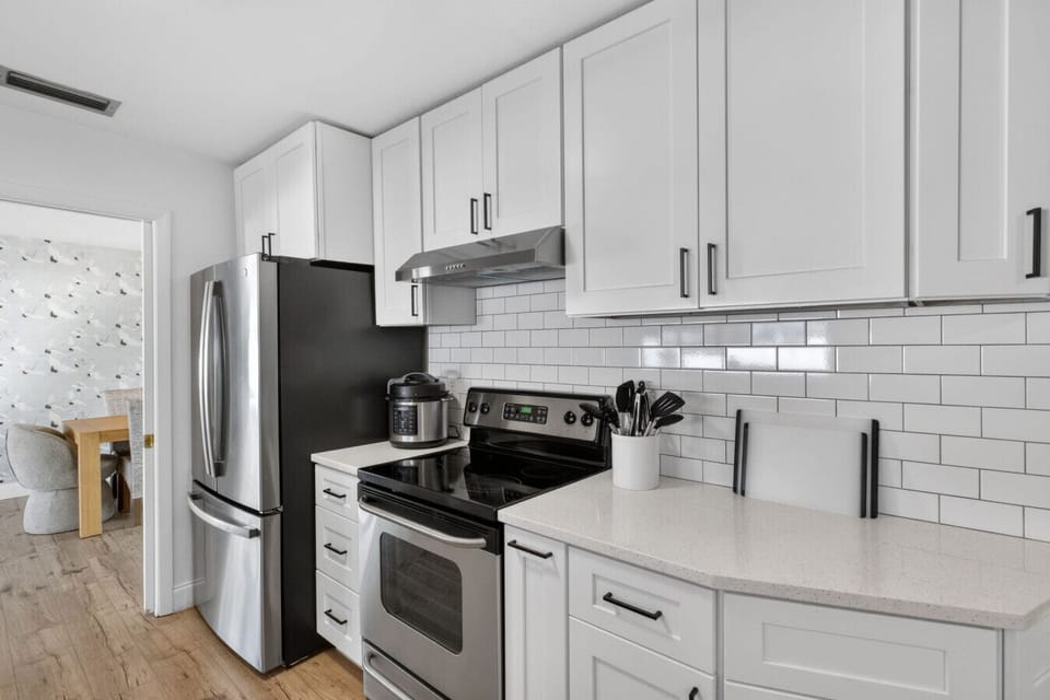 Stainless steel appliances, full cookware, and everything you need for home meals.