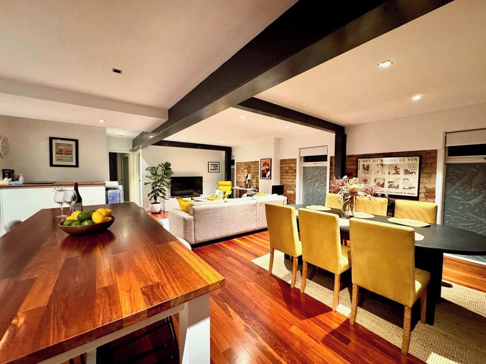 Jarrah floors throughout the entire living area beautifully lit at night