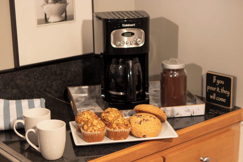 12-cup drip coffee maker and initial supply of ground coffee provided
