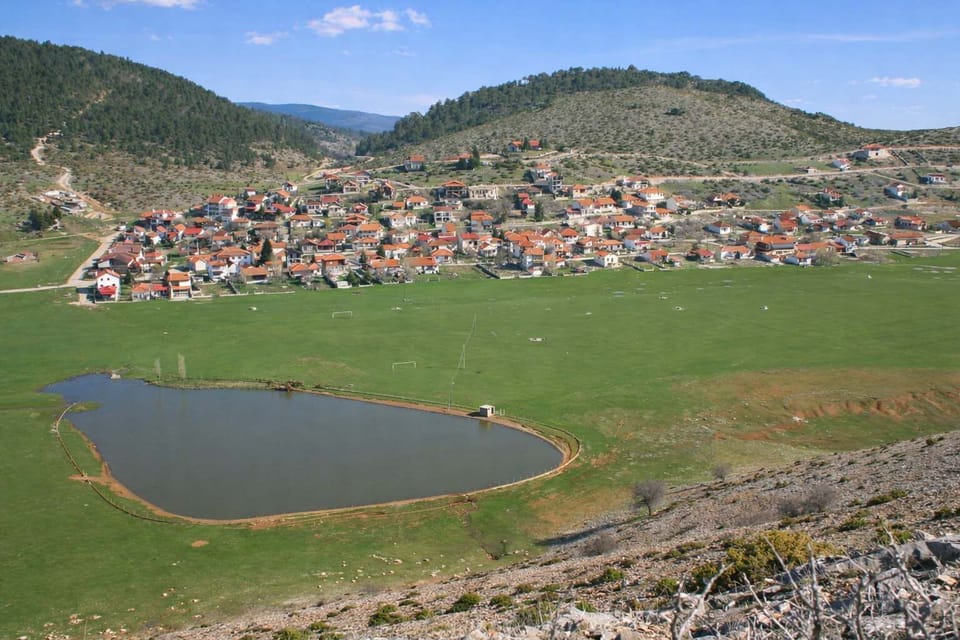 Landscape View of Xiropigado and Open Countryside
Expansive view across the fields, village, and surrounding hills.
