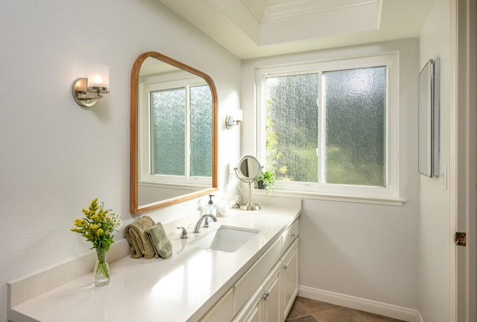 Bright vanity area with generous counter space and natural light, making daily routines easy and comfortable. A thoughtful touch for guests settling into longer stays in Diamond Bar.