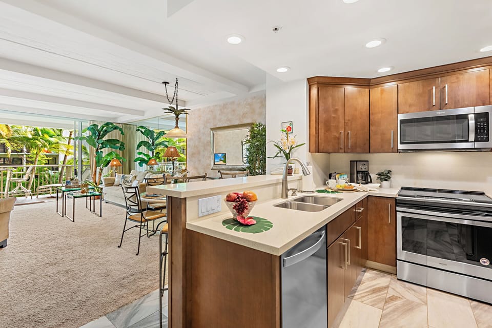 Fully equipped kitchen with a generous breakfast bar, comfortable seating, and modern appliances. Ideal for casual dining or enjoying your morning coffee before a day in paradise.