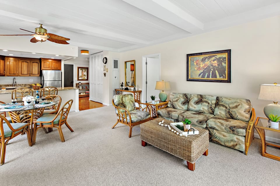 Relax in your spacious tropical-themed living space with bamboo furnishings, open kitchen, and island-inspired decor that makes you feel instantly at home.