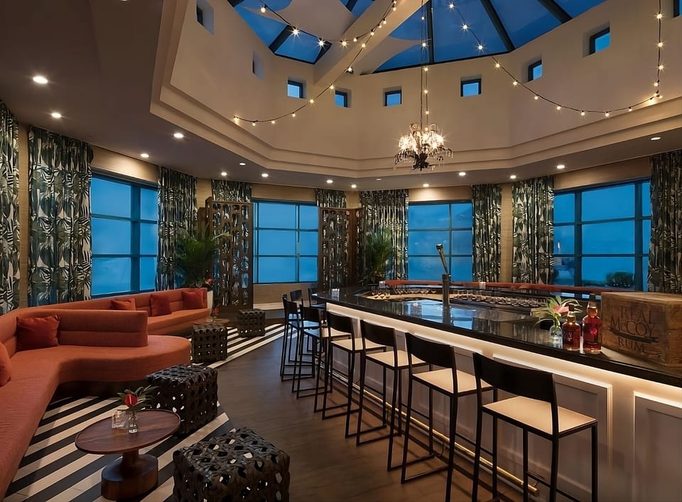 Sip craft cocktails beneath sparkling lights in a chic lounge.