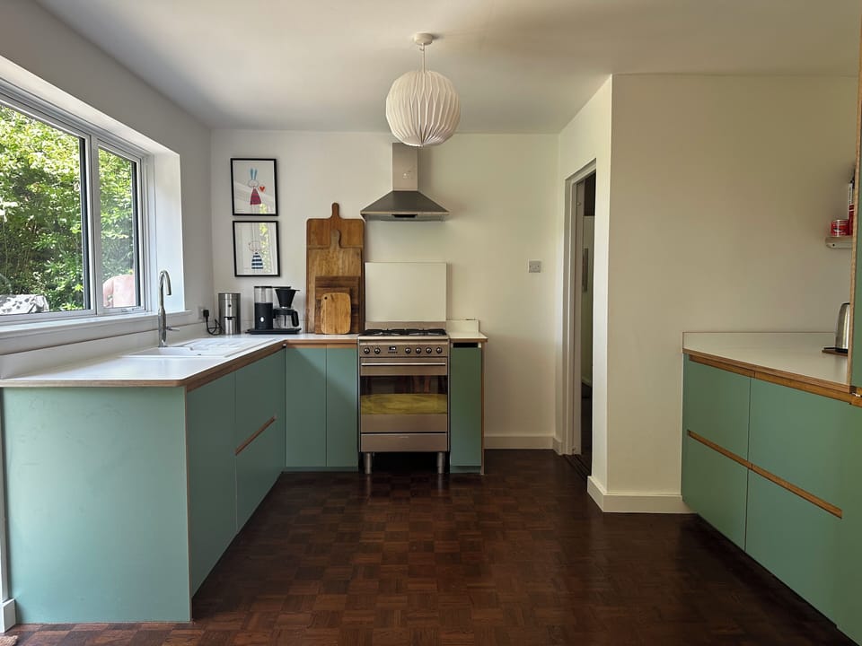 Our kitchen is well equipped with a gorgeous view of the garden.