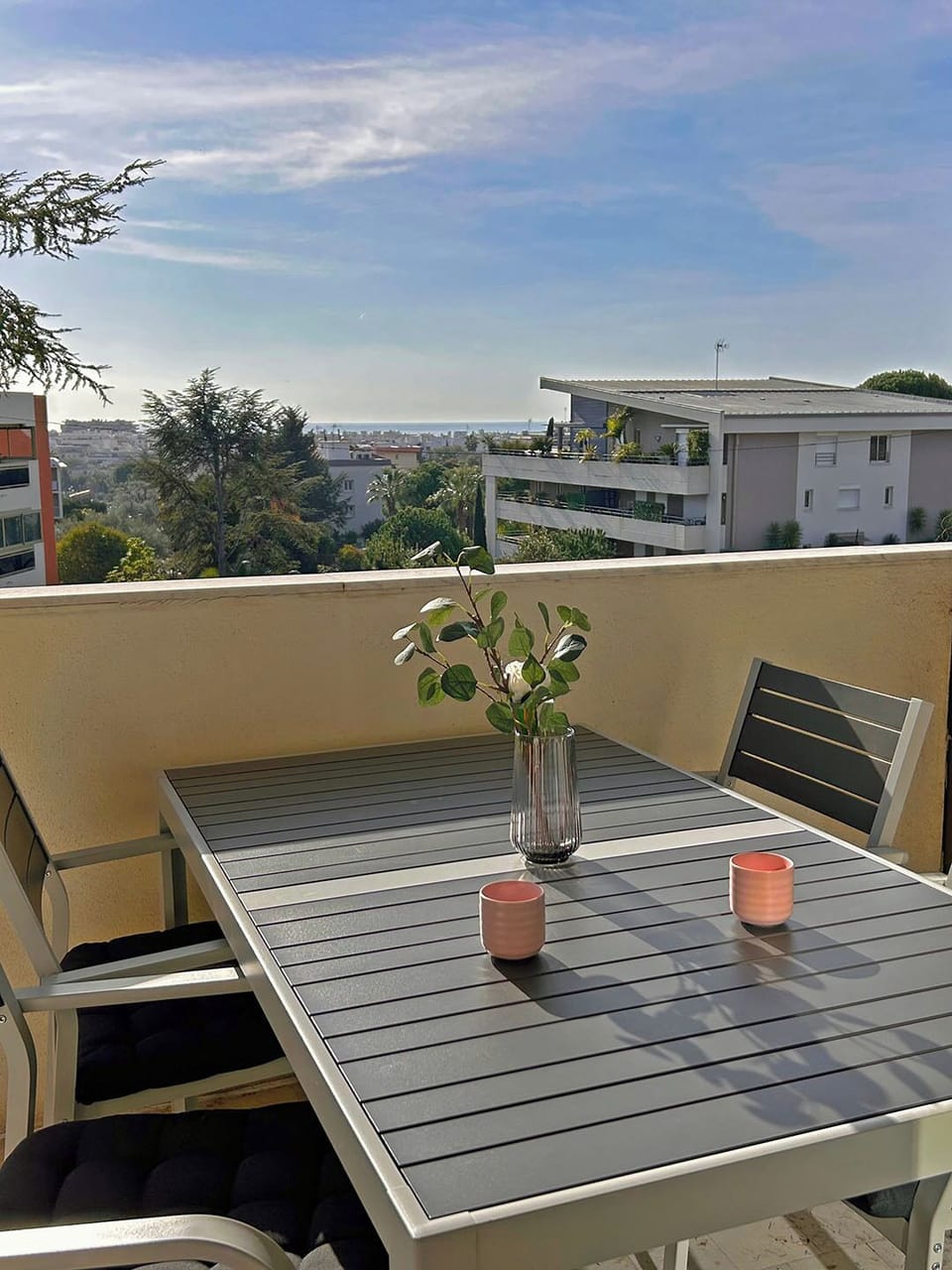 The outdoor dining area with a sea view.